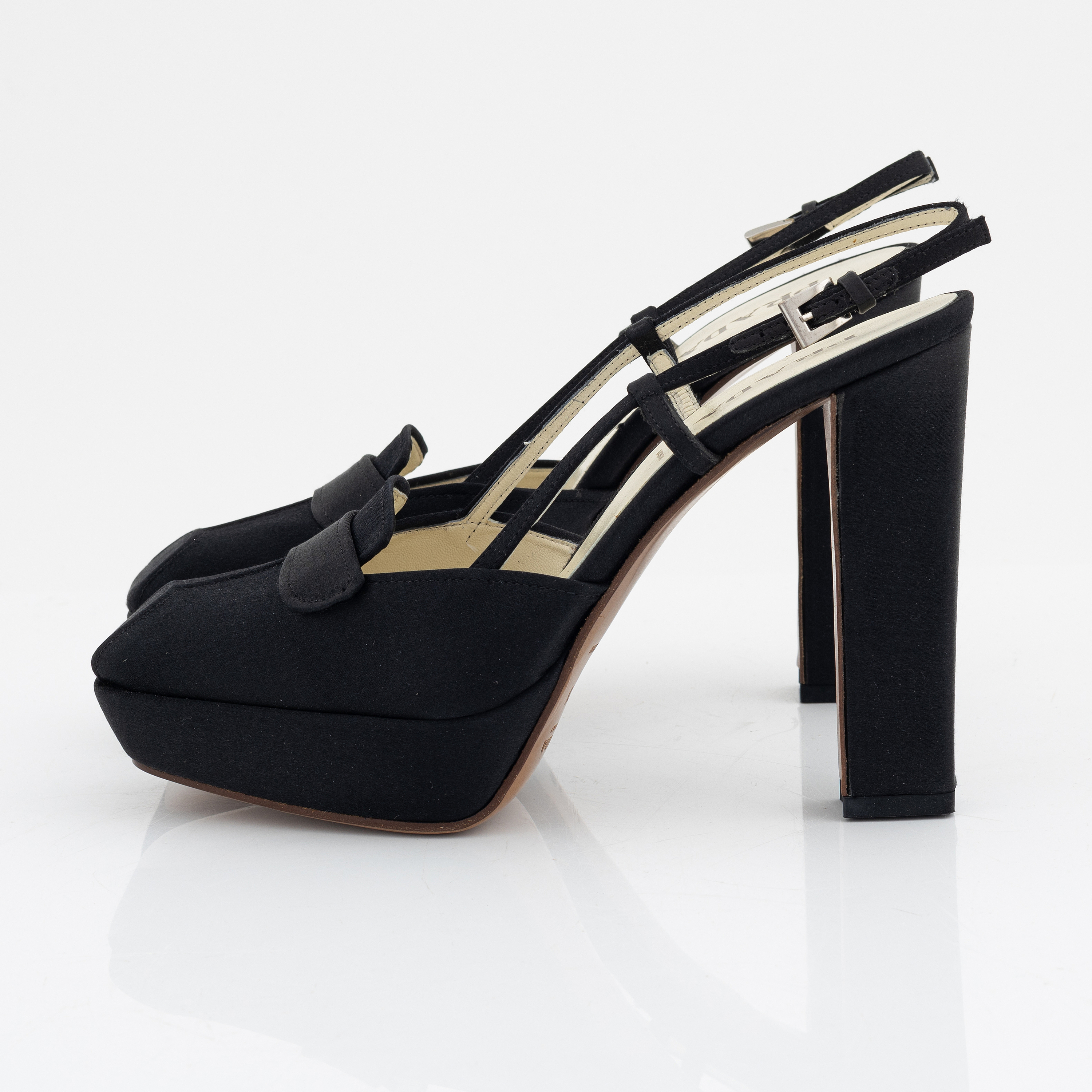 Prada, a pair of black silk pumps, size 36 1/2. - Bukowskis