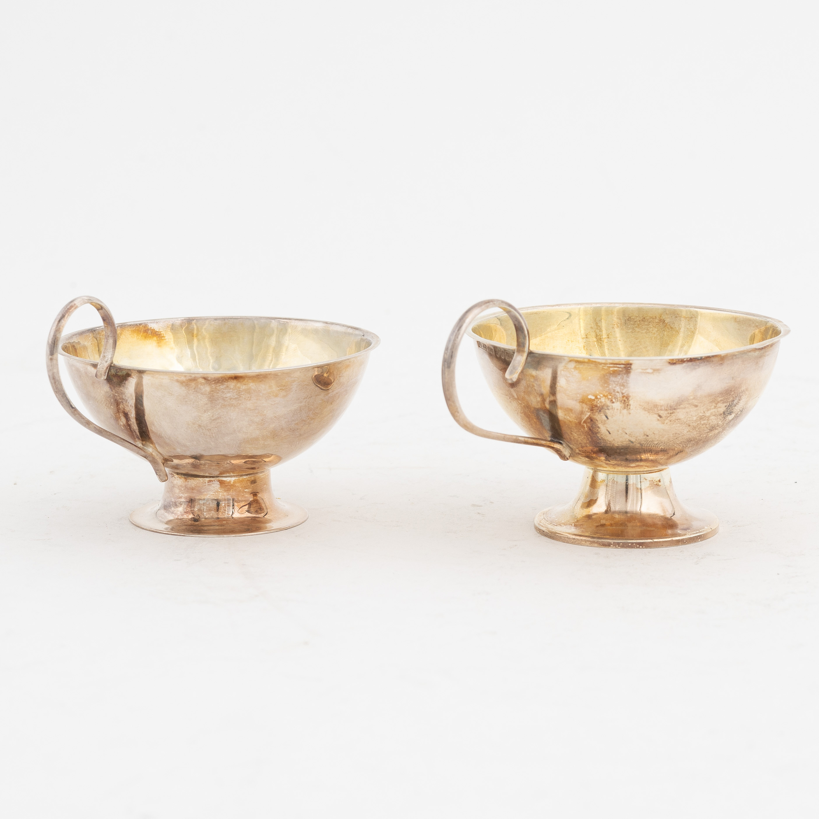 18 silver punsch cups, including GAB, Eskilstuna, Sweden, 1979. Bukowskis