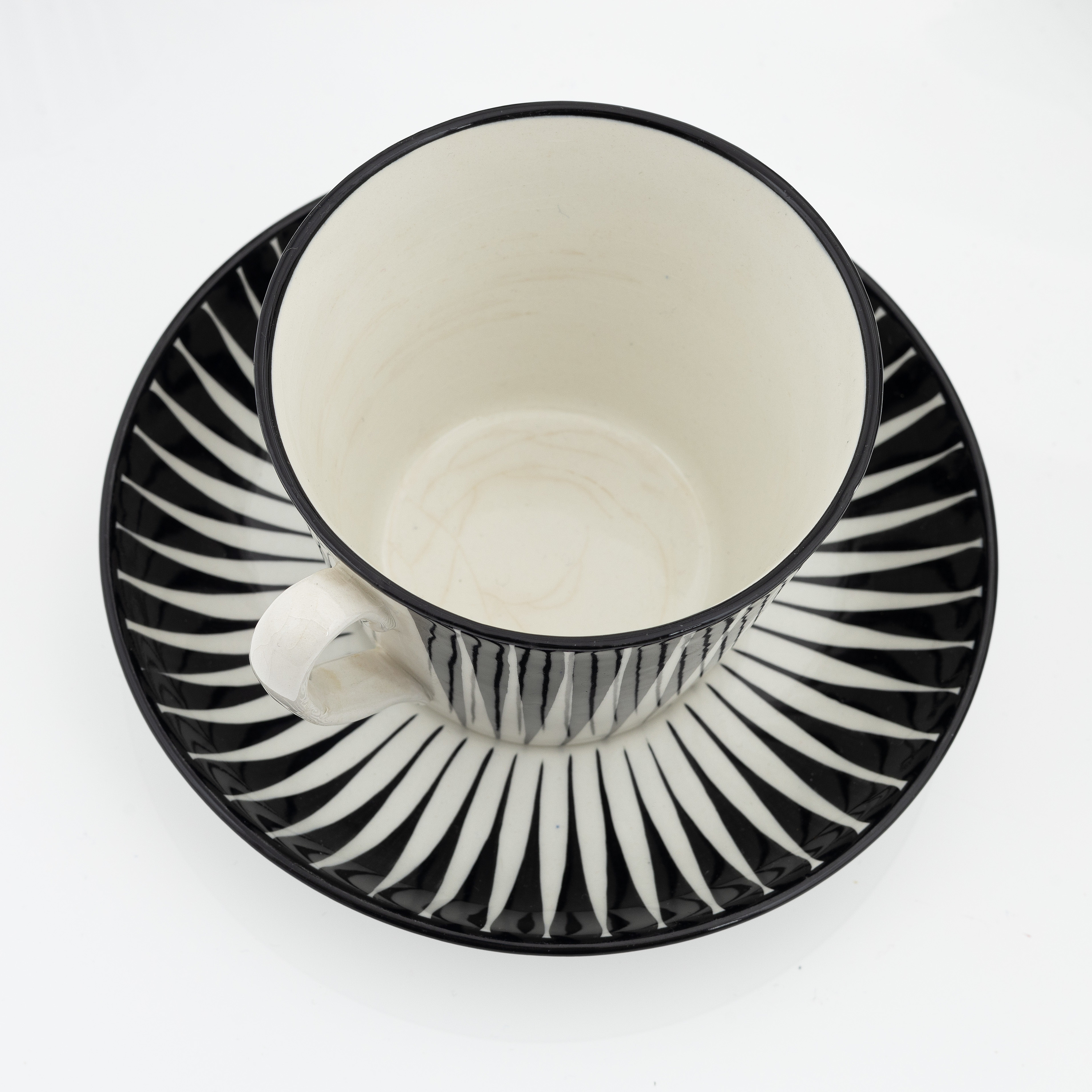 Eugen Trost, six creamware 'Zebra' tea cups with saucers, Gefle