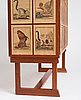 Josef Frank, 'Apskåpet' (The monkey cabinet), a rare cabinet covered with prints of different monkeys, Svenskt Tenn, Sweden ca 1941.