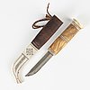 A reindeer horn knife attributed to Hendrik Juuso, signed and dated -82.