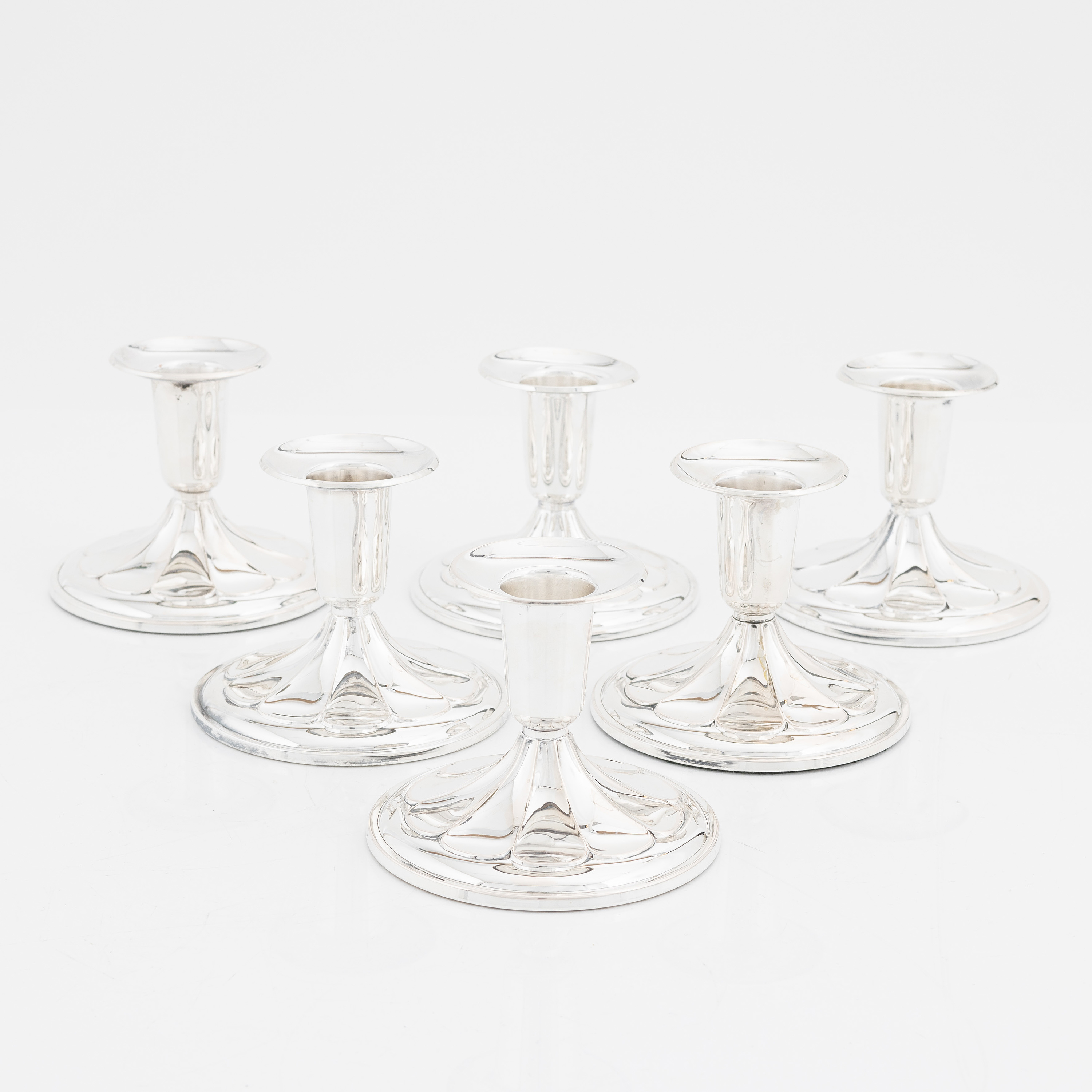 A set of six silver candle sticks by Ceson, K & EC, 195677. Bukowskis