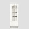 A painted Louis XVI style wallmounted corner cabinet.
