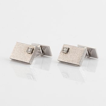 Bucherer 18K white gold and brilliant cut diamond cufflinks.