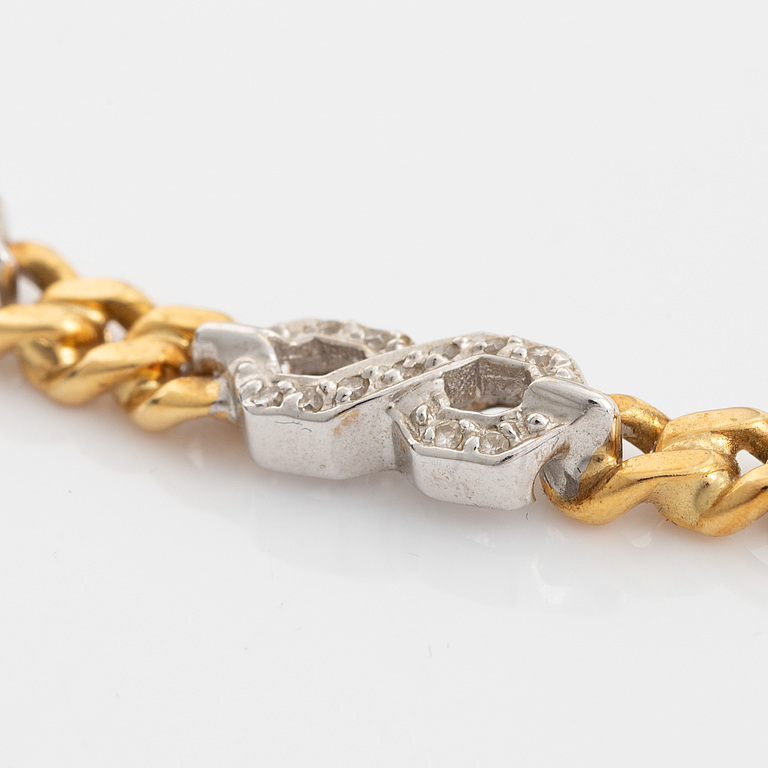 18K gold and small eight cut diamond necklace and bracelet.