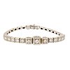 An 18K white gold bracelet with brilliant cut diamonds.