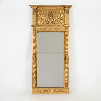 An Empire mirror, first half of the 19th Century.