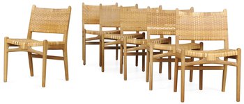 951. A set of six Hans J Wegner oak and rattan chairs, Carl Hansen, Odense, Denmark.