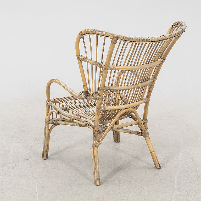 A mid 1900s bamboo and rattan armchair.