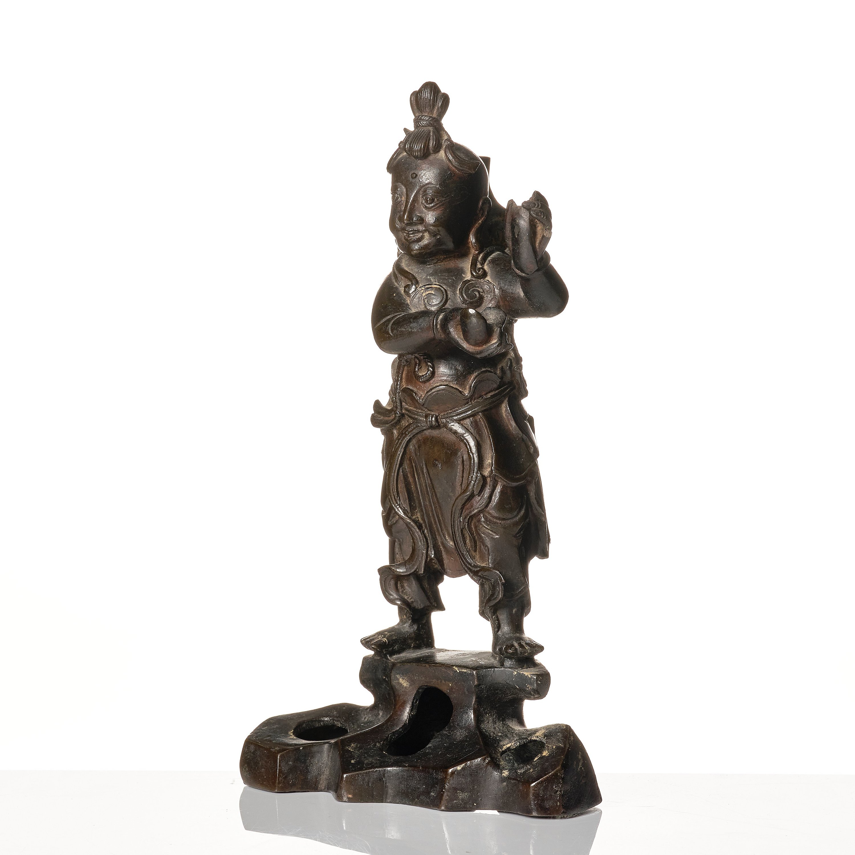 A bronze sculpture/joss stick holder, Ming dynasty (13681644). Bukowskis