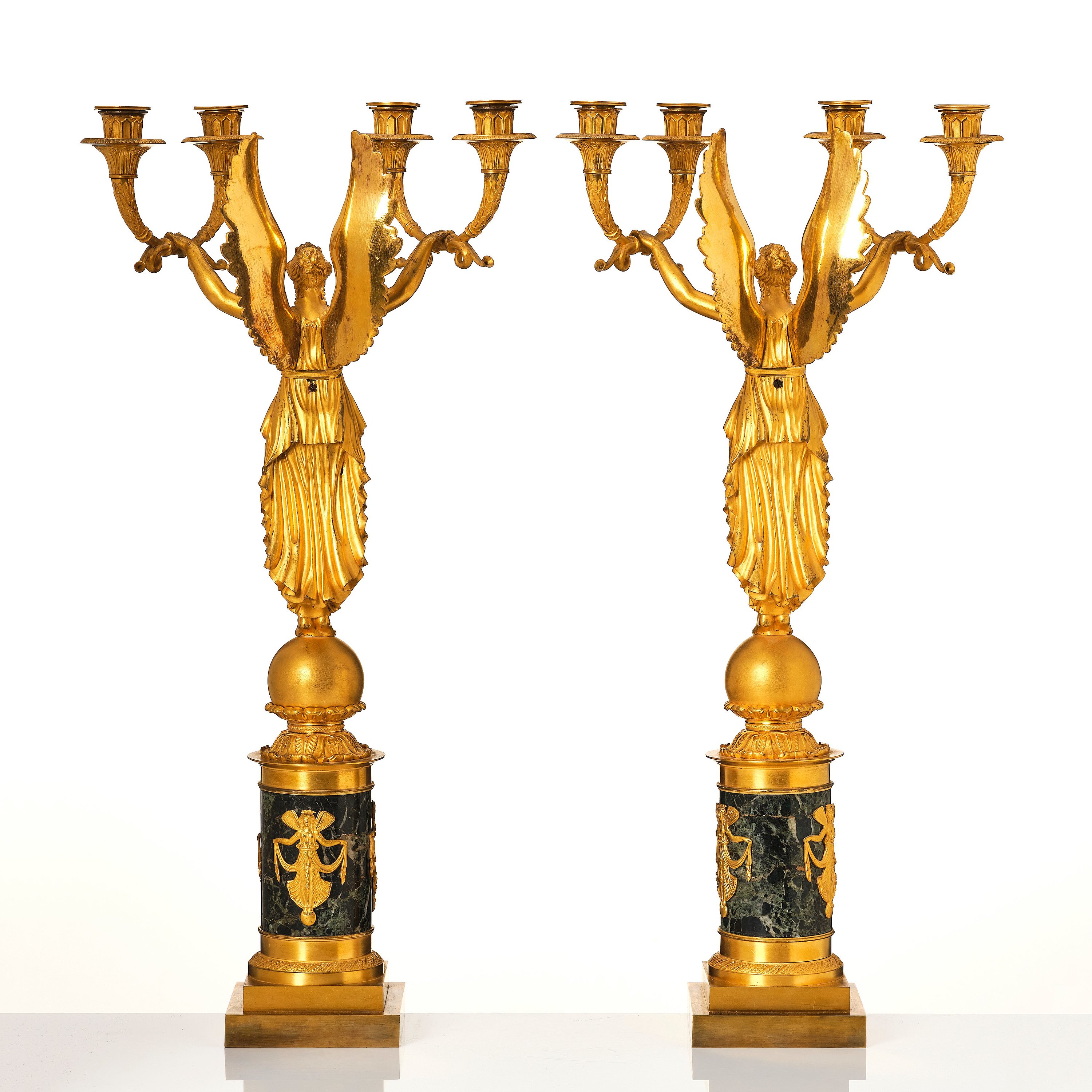 a-pair-of-french-empire-four-light-candelabra-attributed-to-francois