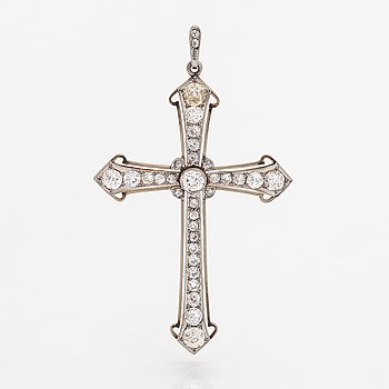 An 18K gold cross pendant with old-cut diamonds ca. 5.43 ct in total. With certificate.