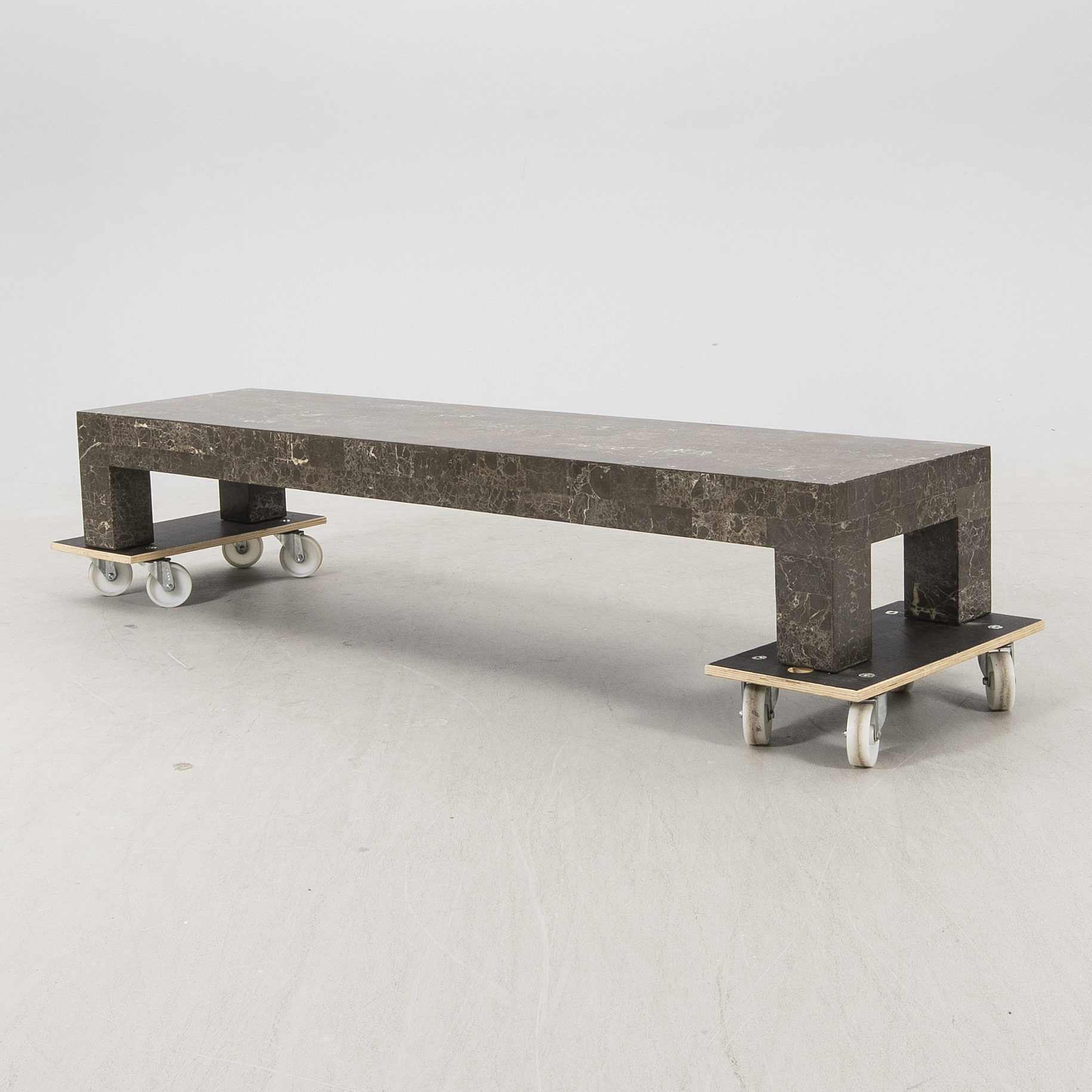 A late 20th century/21 st century travertin coffee table/sideboard. Bukowskis