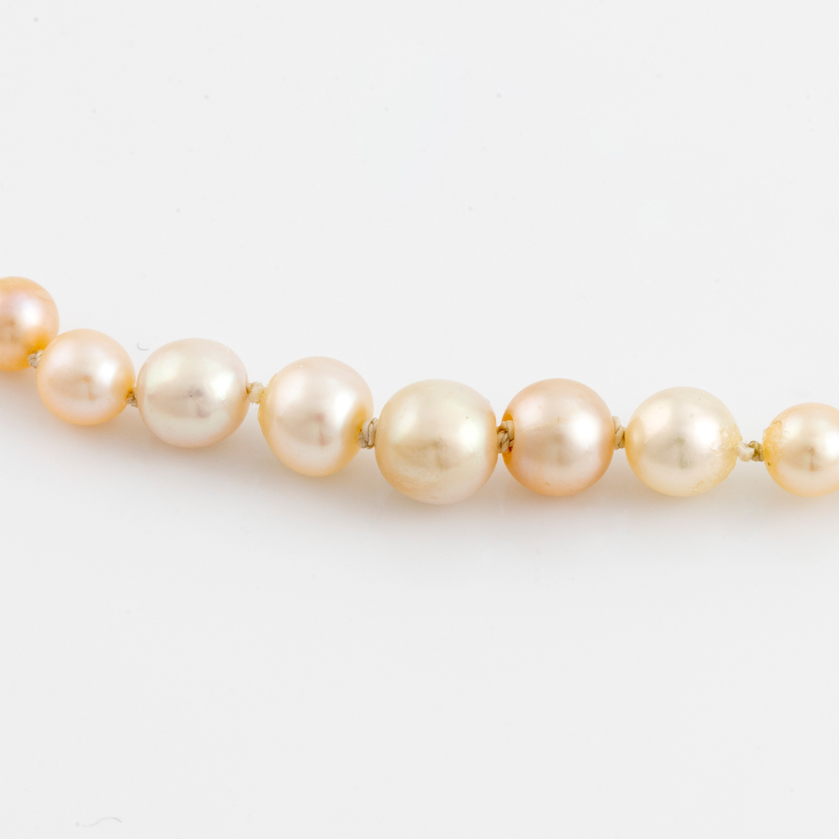 Pearl necklace, clasp with old and rose cut diamonds. Bukowskis