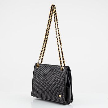 Bally, a quilted black leather bag.