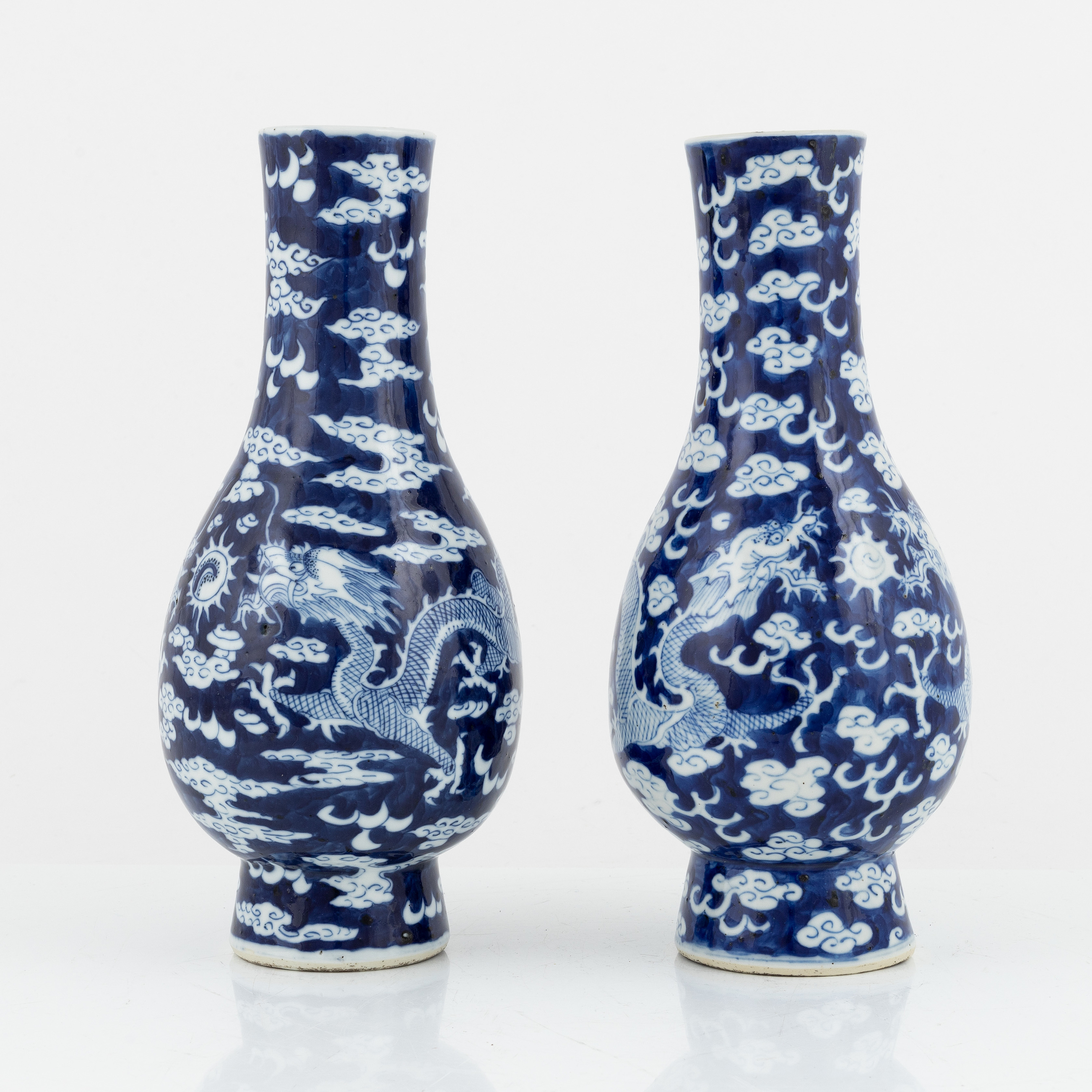 A pair of blue and white vases, China, late Qing dynasty, around 1900