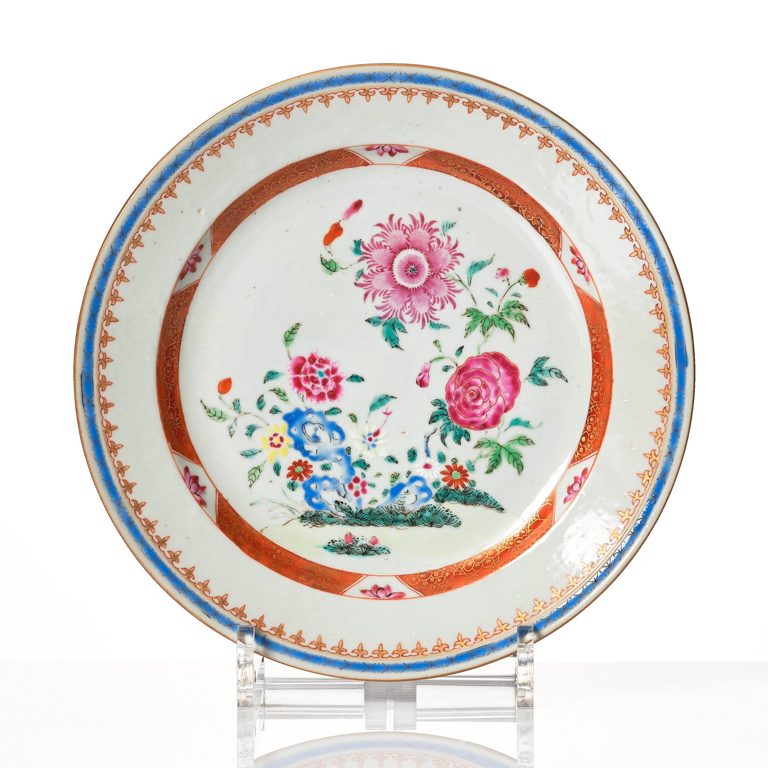 A set of 12 famille rose Chinese Export dinner plates and a serving