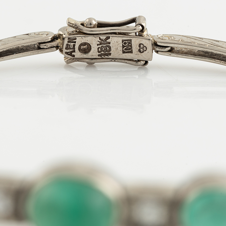 Cabochon cut emerald and brilliant cut diamond bracelet.