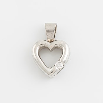 White gold and brilliant cut diamond heart pendant.