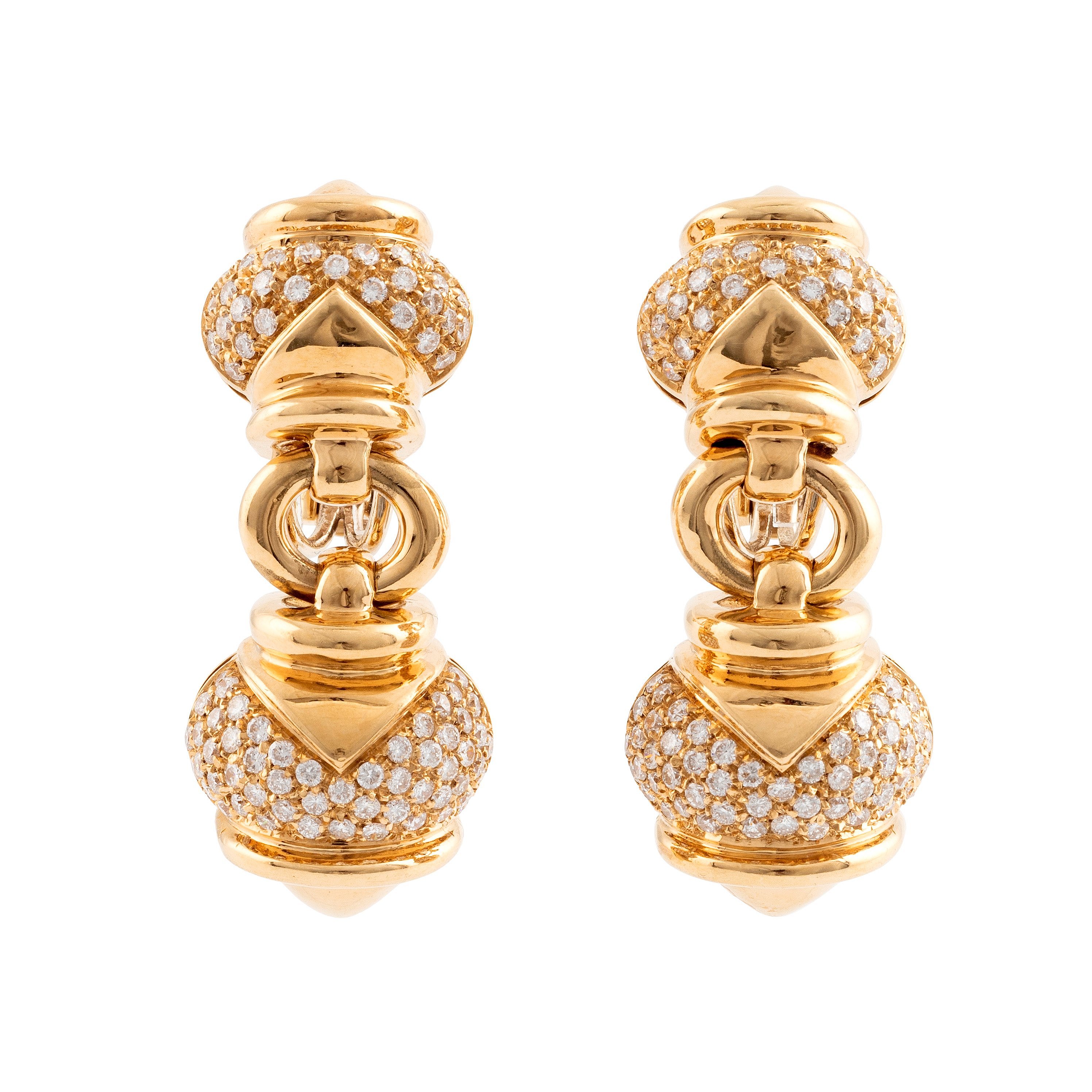 A pair of 18K gold earrings set with round brilliantcut diamonds