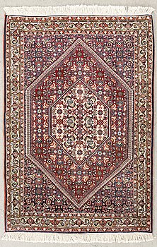 An old Bidjar carpet approx 100x71 cm.