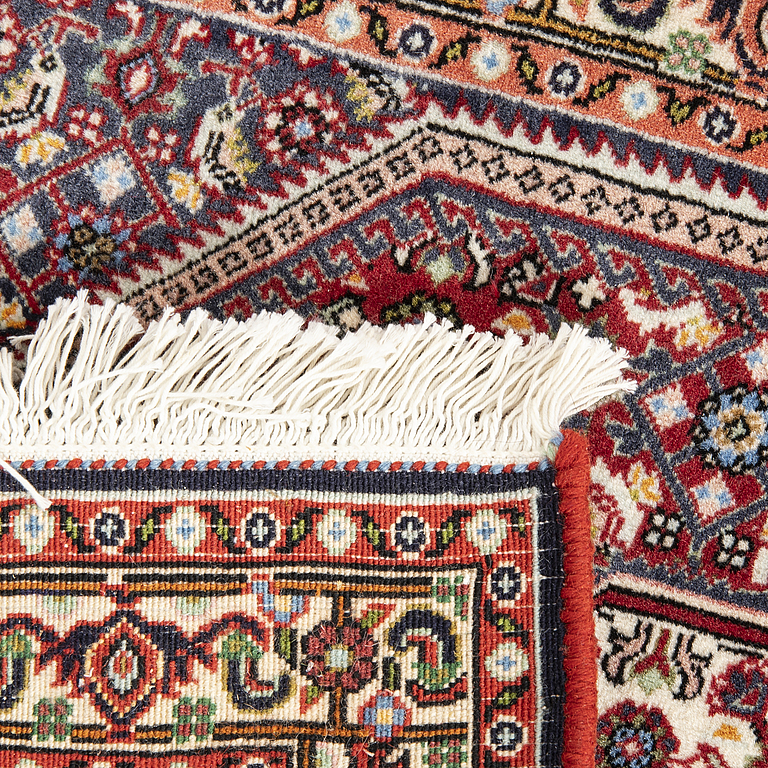 An old Bidjar carpet approx 100x71 cm.