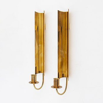 Pierre Forssell, a pair of brass wall scones "Reflex" from Skultuna, end of the 20th century.