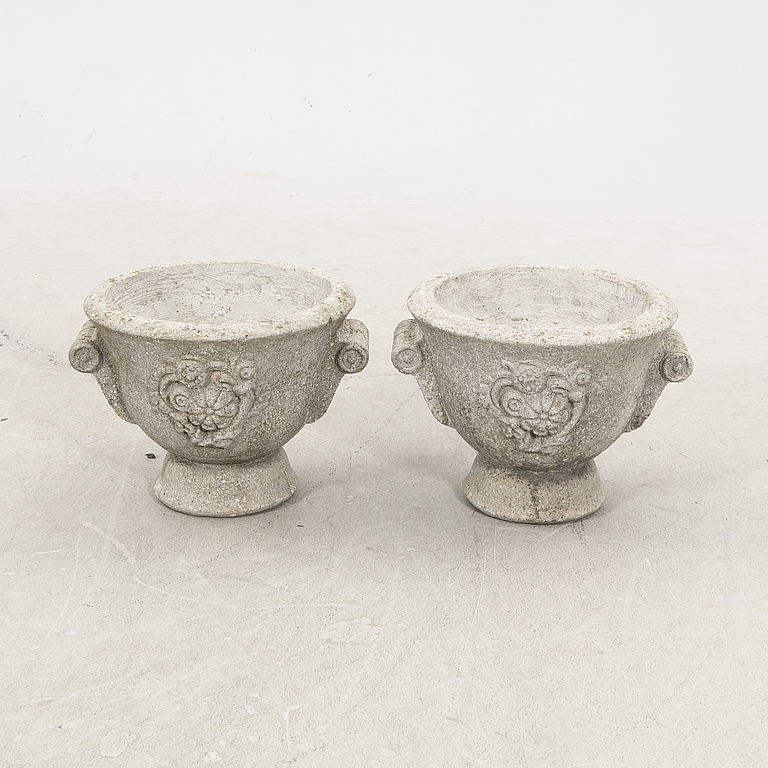 A pair of concrete garden urns 20th century.
