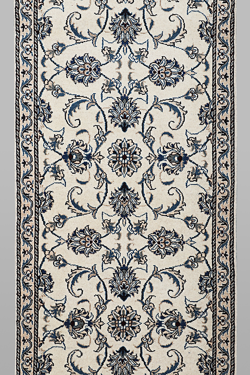 A runner carpet, Nain, part silk, ca 248 x 72 cm.