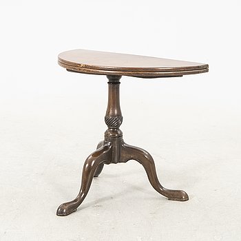 An English Queen Anne mahogany folding table 18th century.