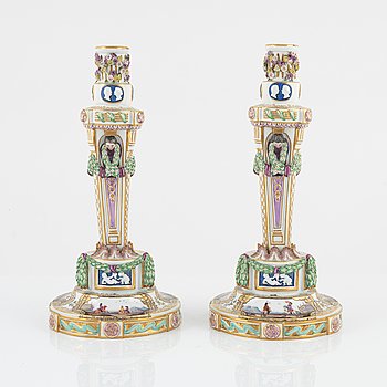 A pair of Meissen candle sticks, circa 1900.
