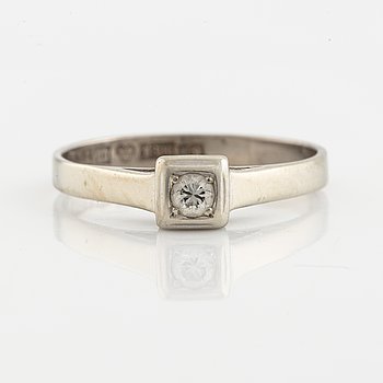 White gold and brilliant cut diamond ring.