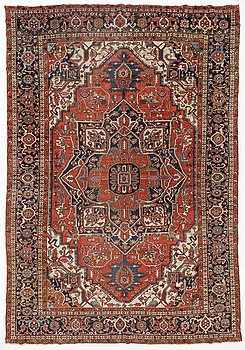 An antique Heris/Karadja carpet, approximately 501 x 339-353 cm.