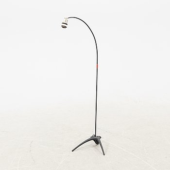 A metal floor lamp from the later part of the 20th century.