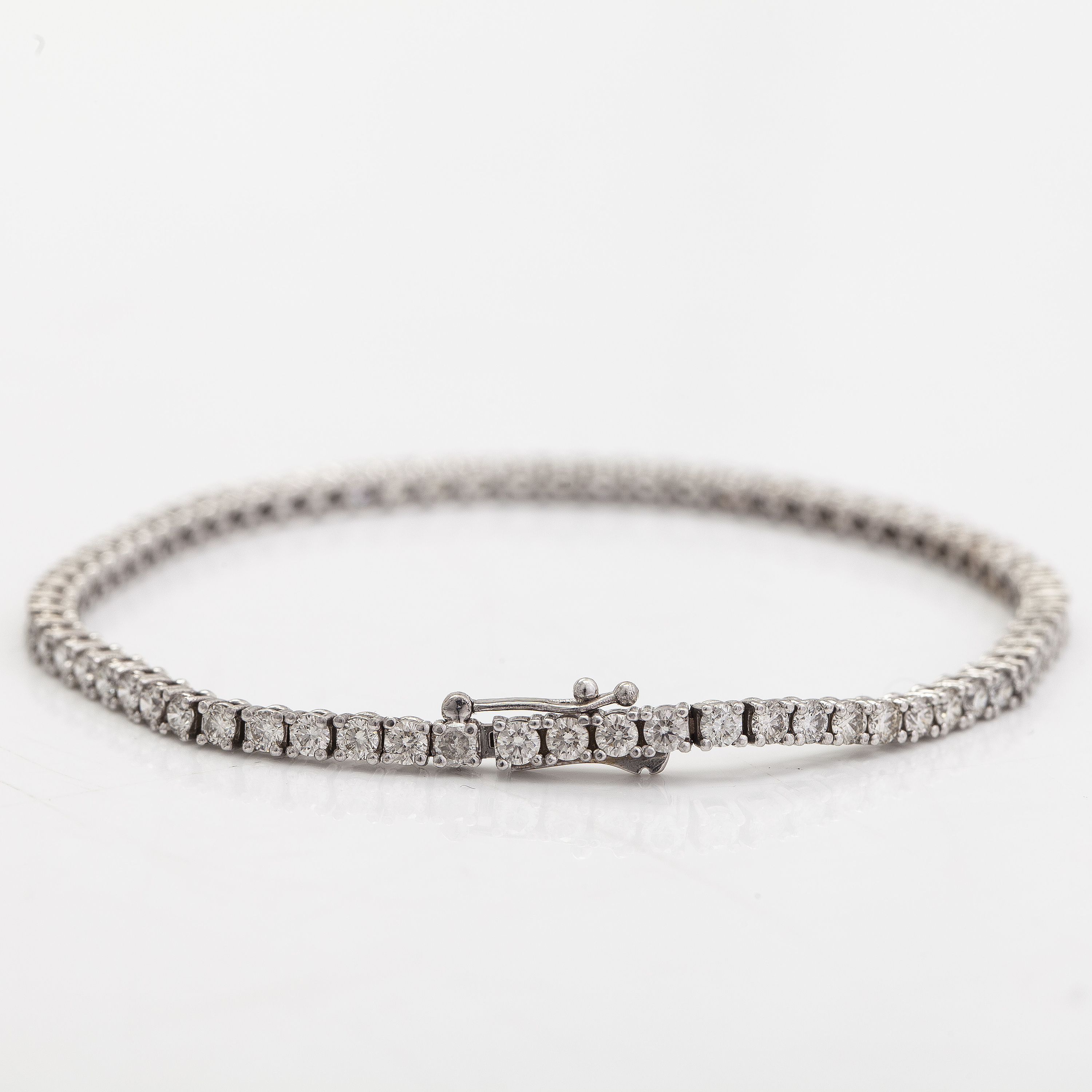 Gouden tennisarmband met diamant