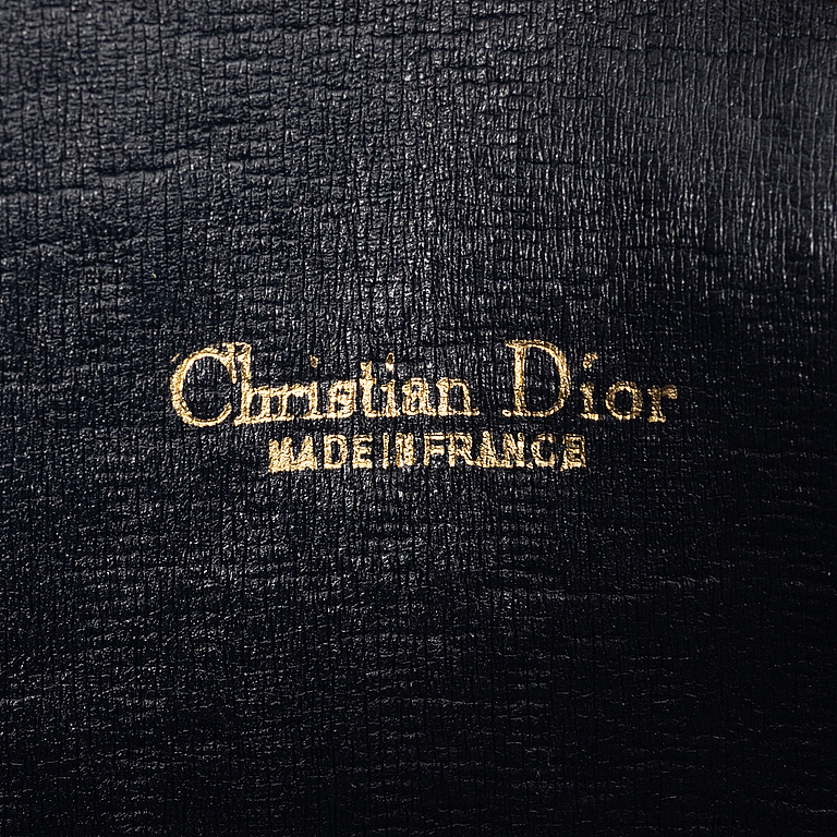 Christian Dior, bag and scarf.