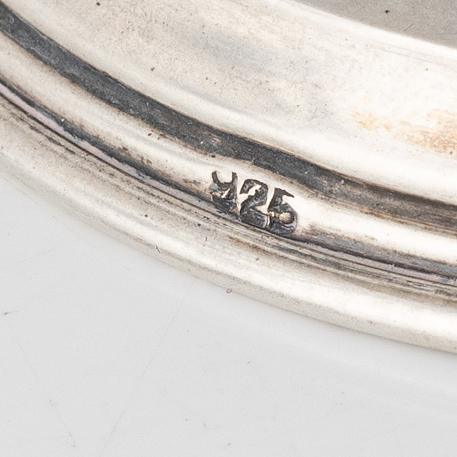 a-pair-of-silver-candle-holders-marked-825-bukowskis
