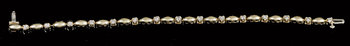 186069. ARMBAND, 14k guld med briljantslipade diamanter, tot. ca 0.60 ct.