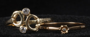 186155. RINGAR, 2 st, 18K guld samt briljanter.