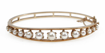 187608. ARMRING, guld 14k samt pärlor. Tot vikt ca 19 gram.