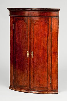 28. A WALL CORNER CABINET.