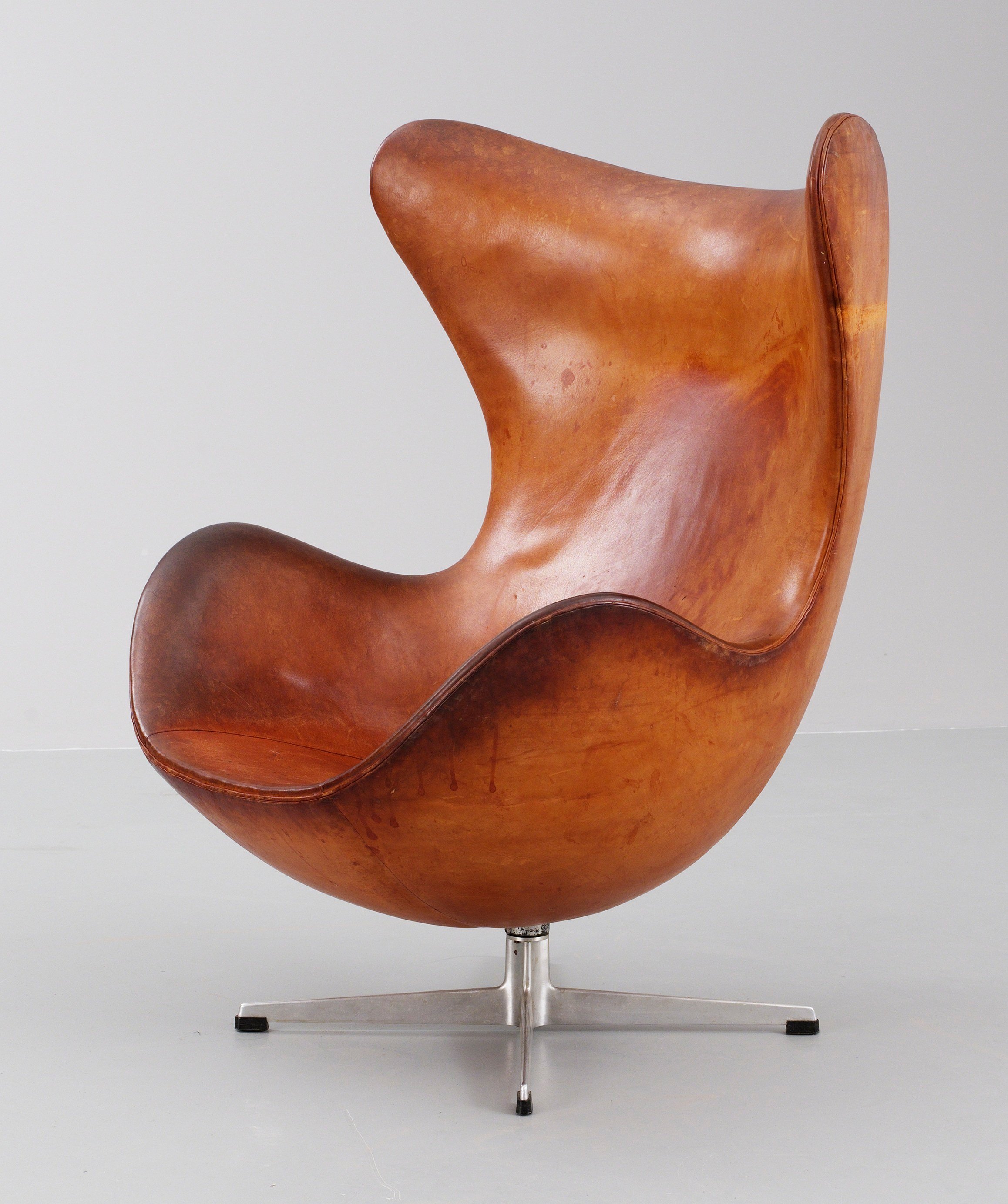 leather egg chair with ottoman