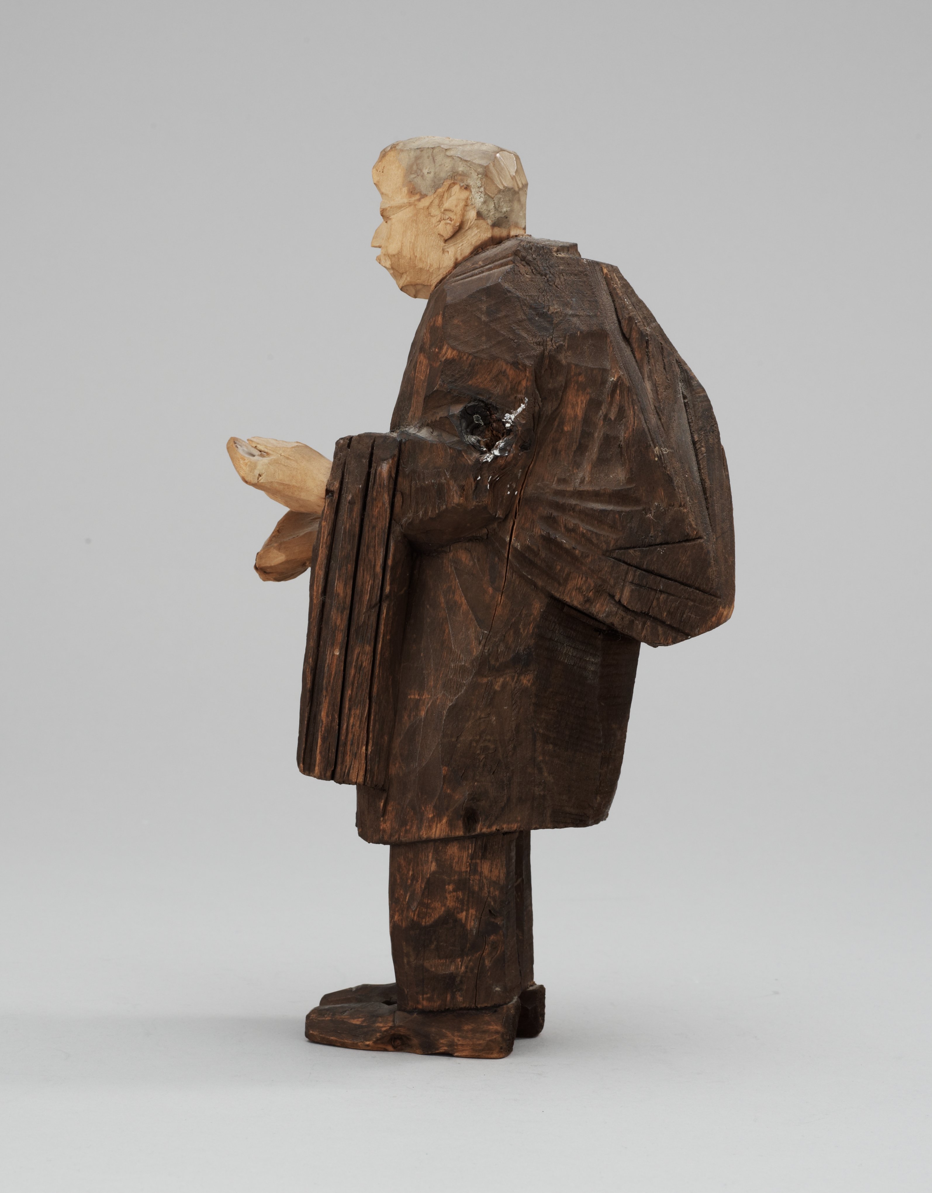 Axel Petersson Döderhultarn, Priest at a funeral. Bukowskis