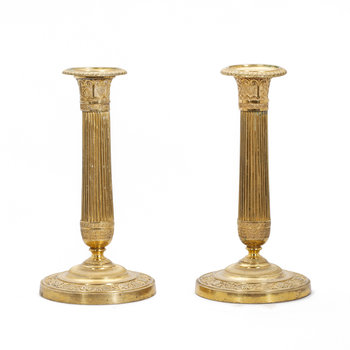 220269. LJUSSTAKAR, ett par, empire, brons, 1800-talets första hälft.