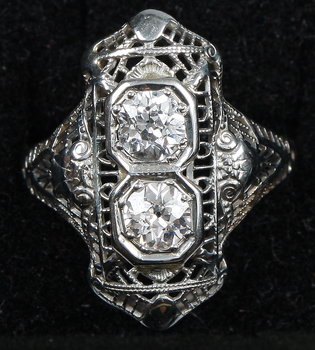 220466. RING, 14k vitguld med två gammalslipade diamanter, tot. ca 0.60 ct.