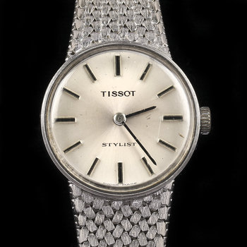 234704. DAMARMBANDSUR, Tissot. 18K vitguld, tot 35 gr.