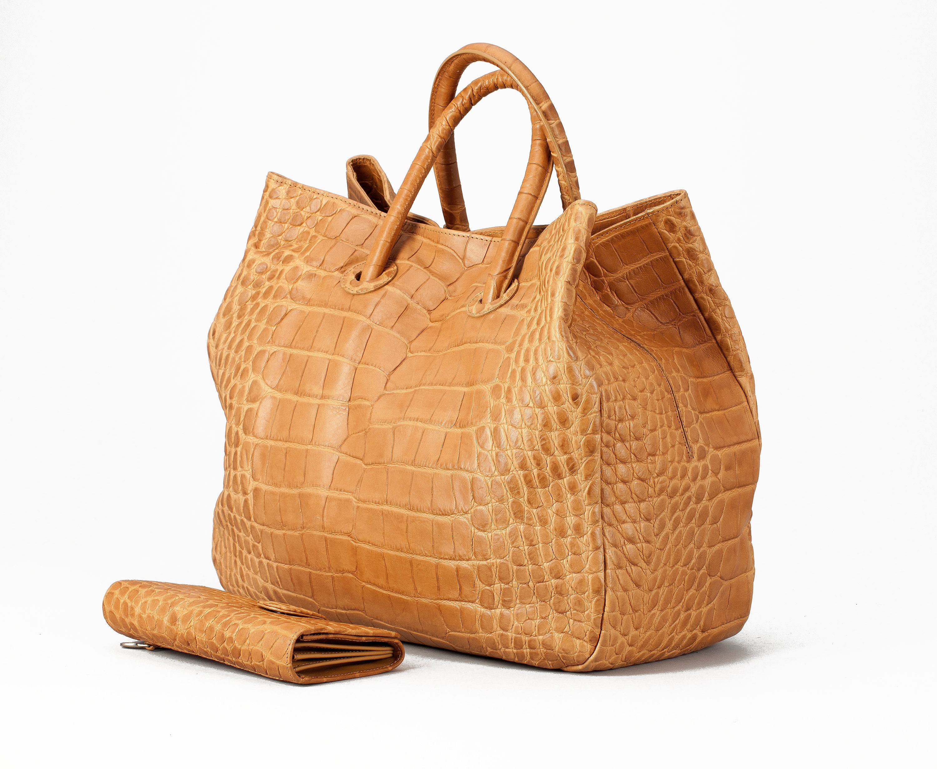 A handbag and pocketbook by Furla. Bukowskis