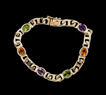 255802. ARMBAND, 14k guld med peridoter, citriner och ametister. Ca 17 g.