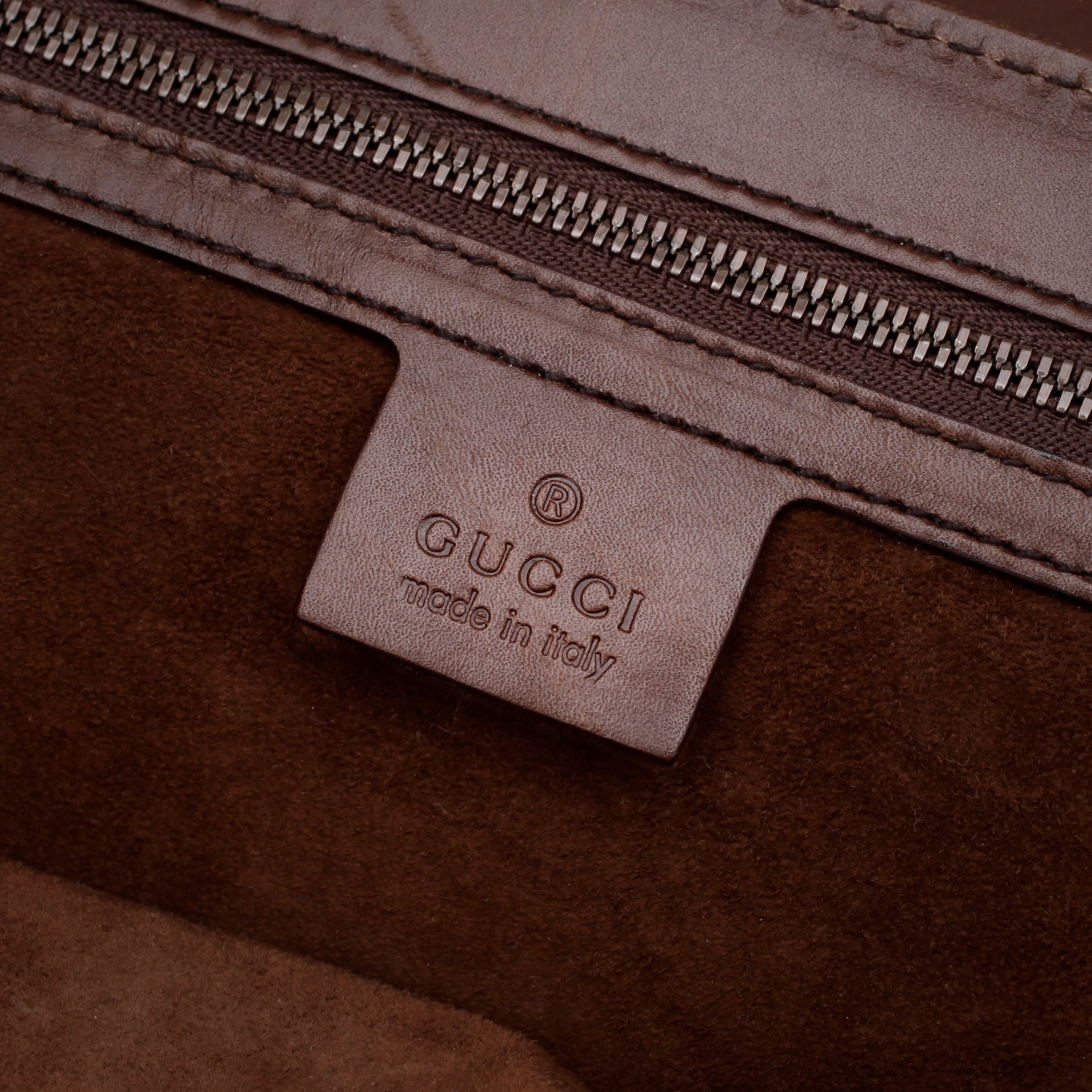 GUCCi, a brown leather shoulder bag. Bukowskis