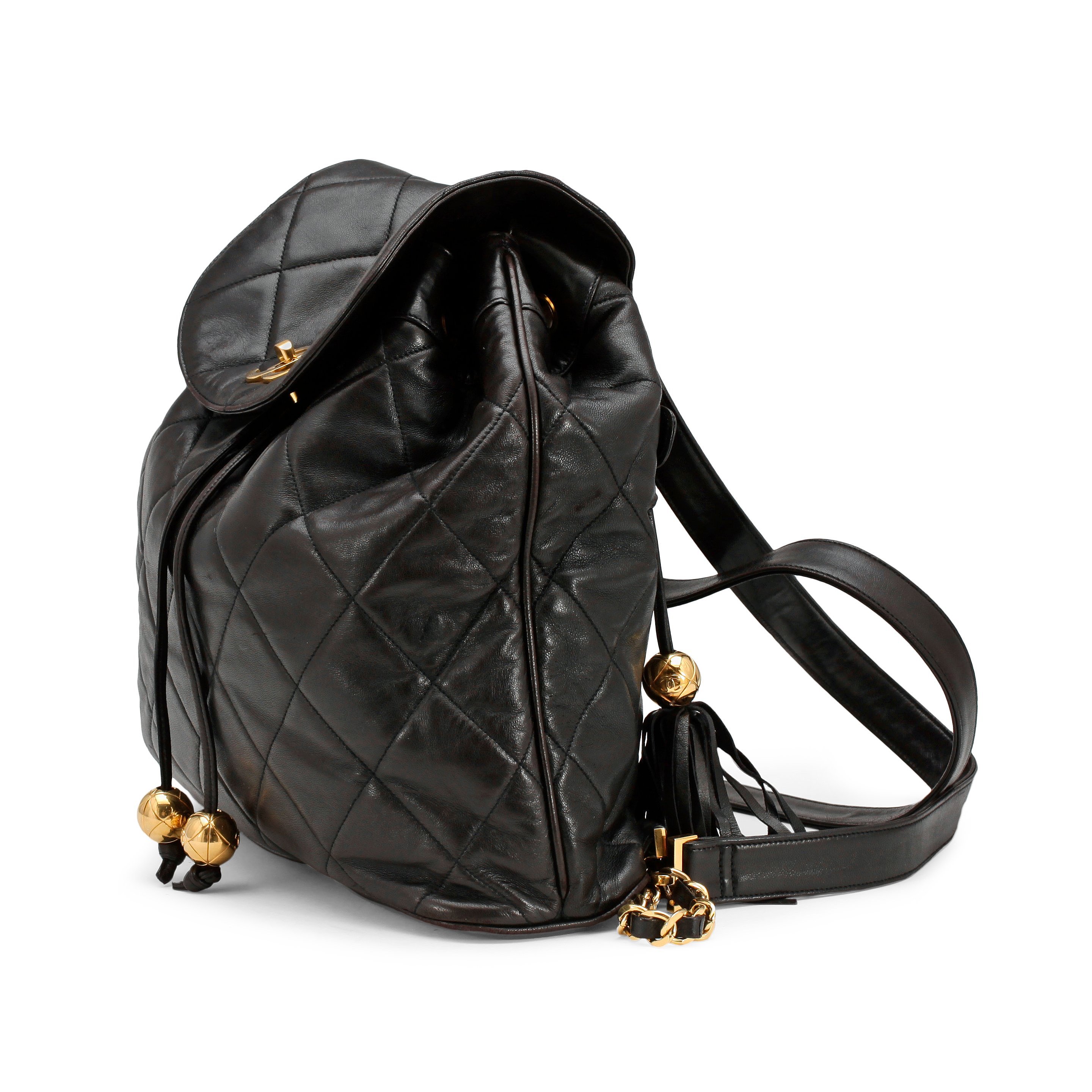 CHANEL, a black leather quilted backpack. Bukowskis